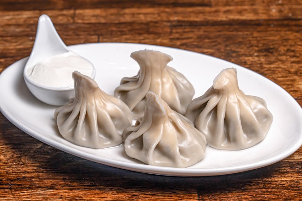 Set tables inside a Brooklyn restaurant.
